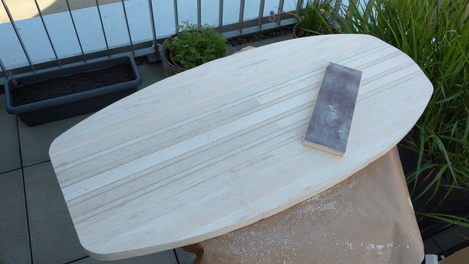 Sanding the board into size and shape